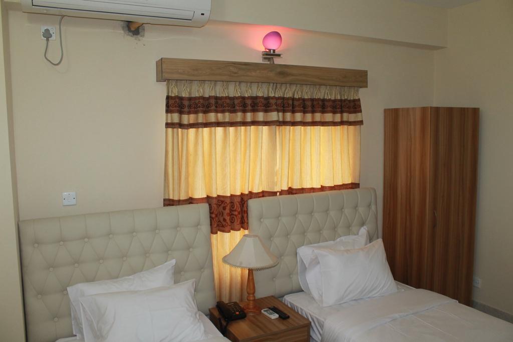 Hotel Shining Touch Limited Dhaka Esterno foto